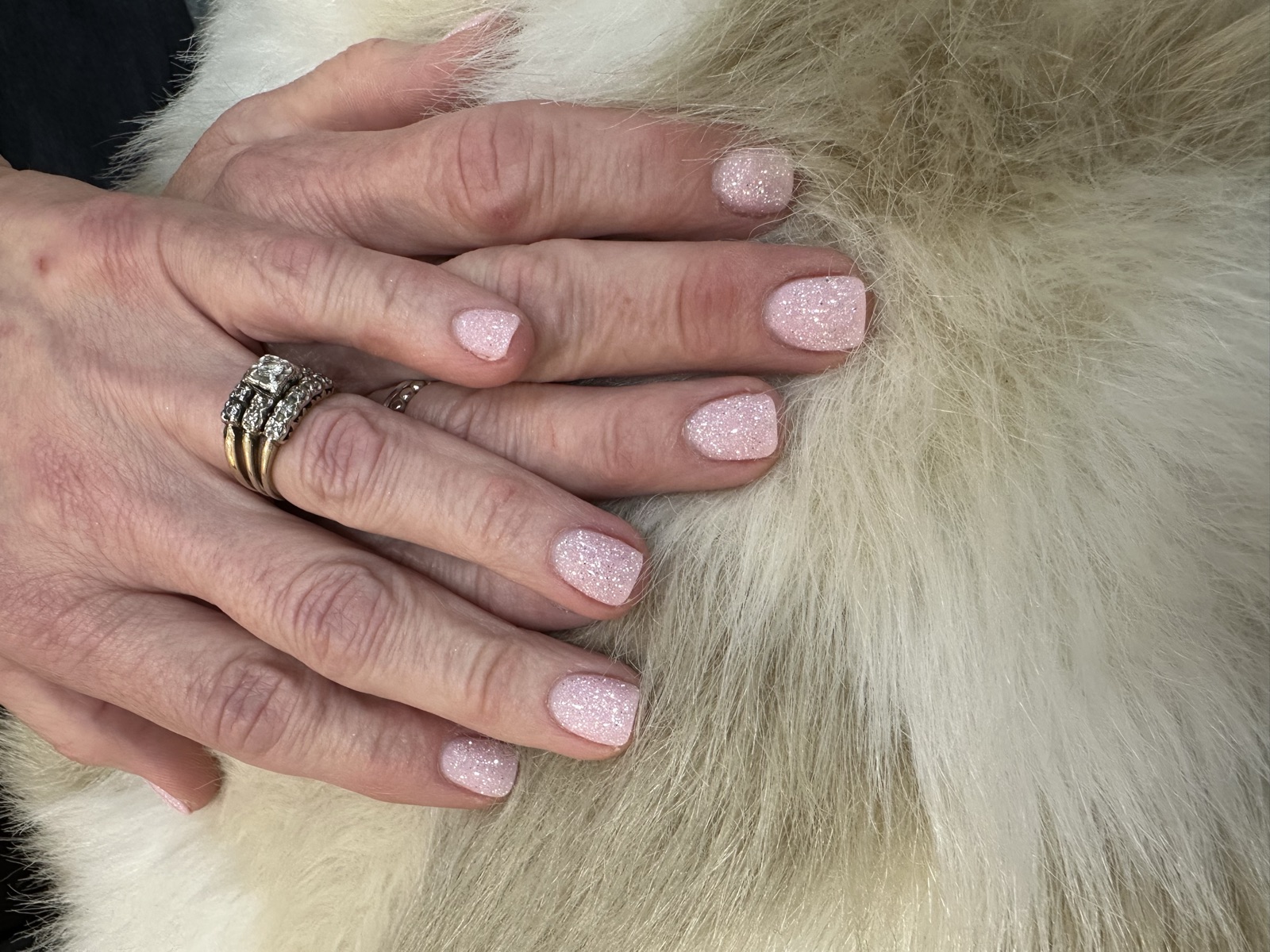 Short square nails with a soft pink glitter manicure