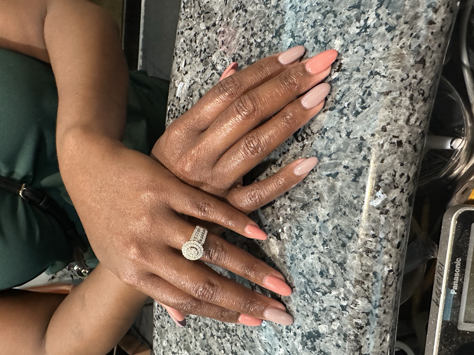 Almond nails with a nude-to-peach ombré finish